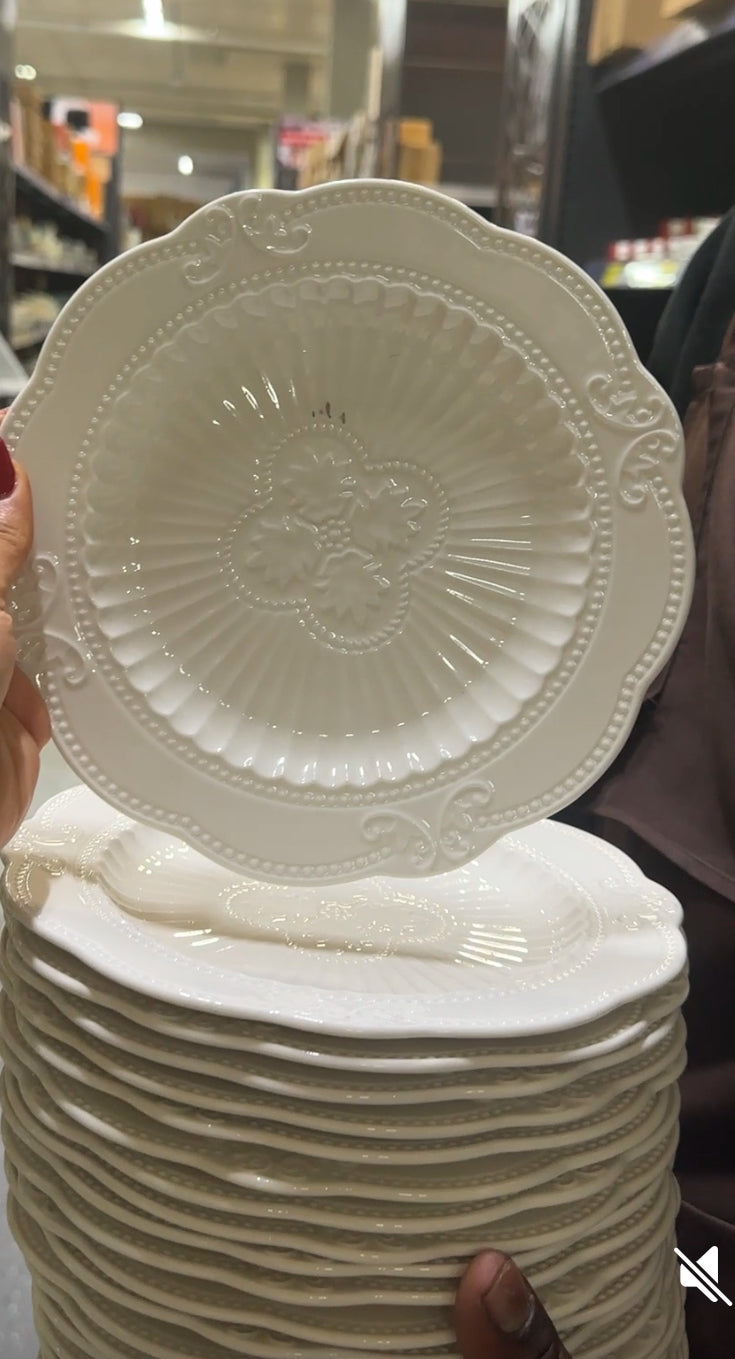 White vintage lace ceramic dessert plate with embossed detail, ideal for cakes or small portions.