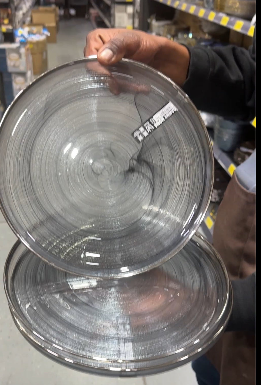 Smoky black round glass plate with minimalist design, perfect for modern dining tables and stylish everyday meals.