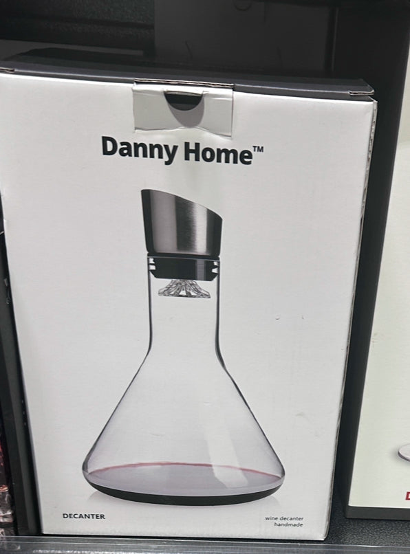 Elegant glass wine decanter with diamond-cut crystal stopper and stainless steel neck – premium wine serving carafe 
