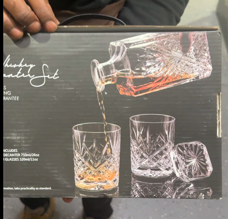 Crystal whiskey decanter set with four matching glasses — premium cut-glass barware for serving whisky or spirits